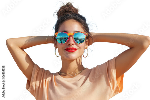 A woman enjoying a sunny day outdoors, wearing colorful sunglasses and striking a confident pose against a bright background