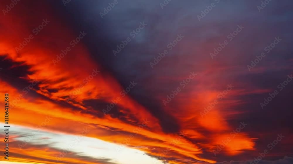 Abstract cloud formations with gradients of deep red, orange, and yellow hues Abstract cloud formations with gradients of deep red, orange, and yellow hues
