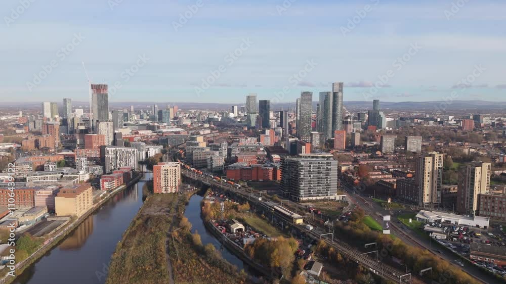 Establishing aerial view of Manchester, city in the United Kingdom on bright day Establishing aerial view of Manchester, city in the United Kingdom on bright day