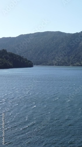 Camera panning across lake haast in new zealand