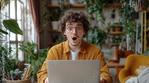 Surprised Man Working in a Green Space photo