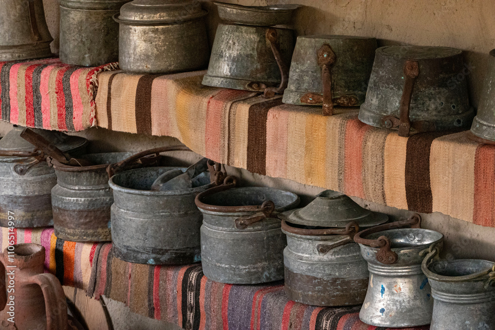 Rustic metal pots on display in a old turkish house, Rustic metal pots on display in a old turkish house,