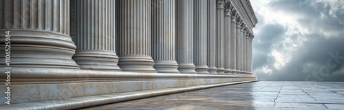 Tall Fluted Stone Columns in Classical Architectural Style on Wet Steps
