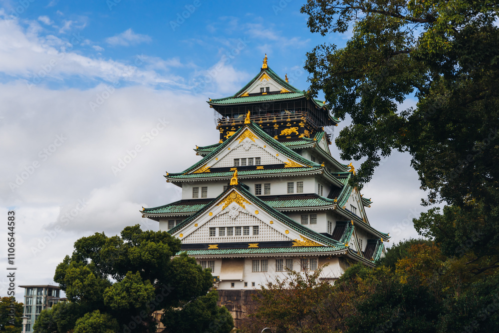 Fototapeta premium Osaka Castle, Osaka city, Japan, summer landscape vibrant view with a blue sky, Osakajo castle building, Kansai region, Osaka prefecture, travel to Japan