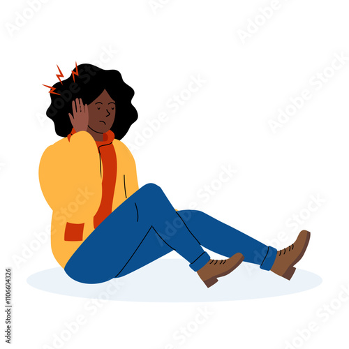 A woman experiencing a headache while sitting on the floor in casual attire at home