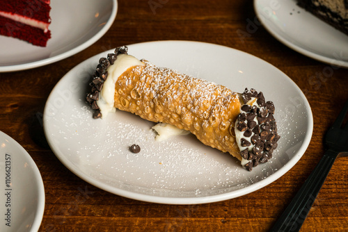 One cannoli on a plate