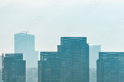 city skyline in the fog