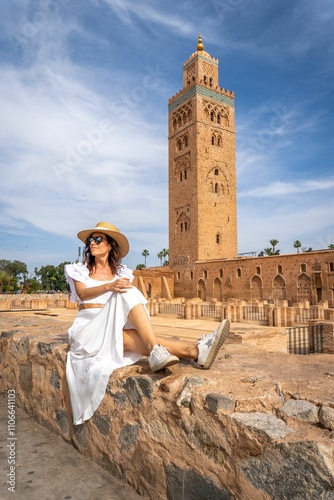 Woman by Koutoubia Mosque in Marrakech photo