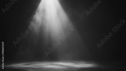 Dramatic spotlight beam in dark, empty room with misty atmosphere