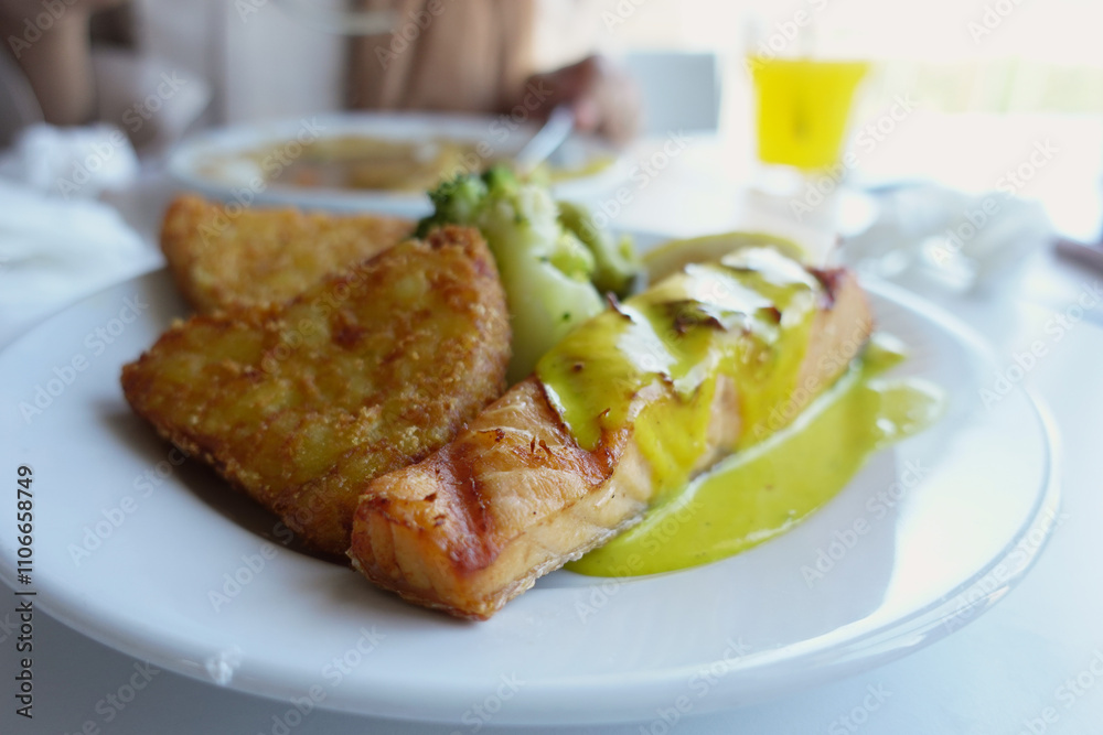 grill salmon served with fresh vegetables on a plate grill salmon served with fresh vegetables on a plate