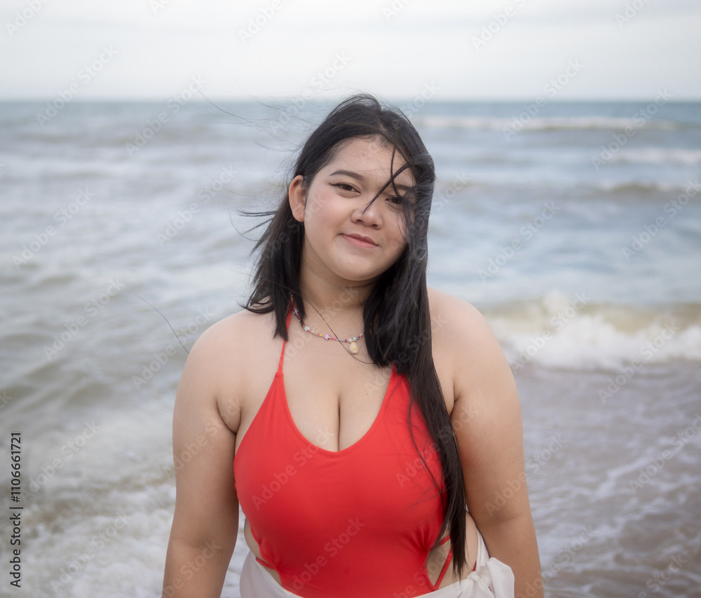 Woman young asian fat chubby cute beautiful smile happy fun enjoy relax freedom bikini swimwear body sexy plus size look sea beach sunset clean blue sky calm nature ocean wave water travel on holiday Woman young asian fat chubby cute beautiful smile happy fun enjoy relax freedom bikini swimwear body sexy plus size look sea beach sunset clean blue sky calm nature ocean wave water travel on holiday