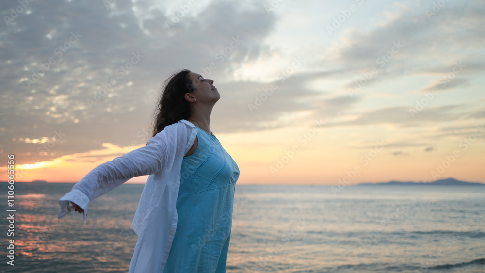woman on beach shore against sunset sky, summer vacation, freedom and relaxation woman on beach shore against sunset sky, summer vacation, freedom and relaxation