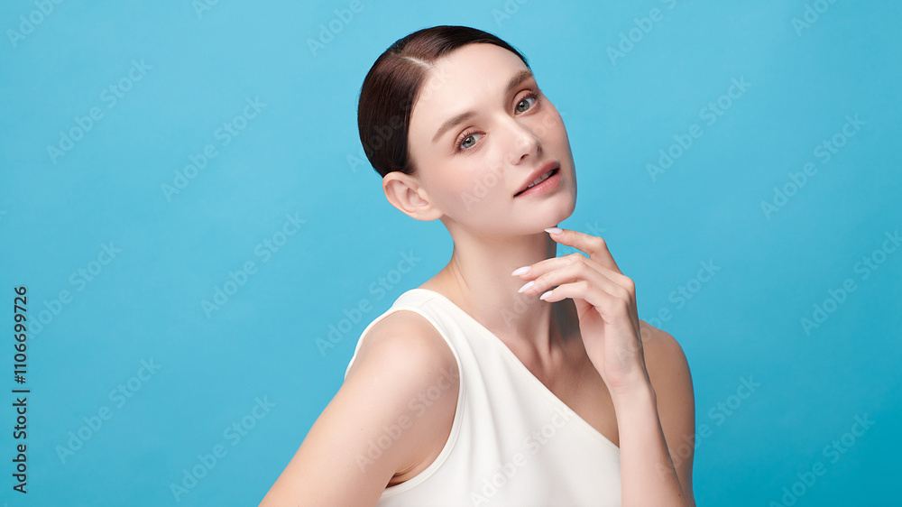 Beautiful young woman with clean fresh skin on blue background, Face care, Facial treatment, Cosmetology, beauty and spa, women portrait. Beautiful young woman with clean fresh skin on blue background, Face care, Facial treatment, Cosmetology, beauty and spa, women portrait.