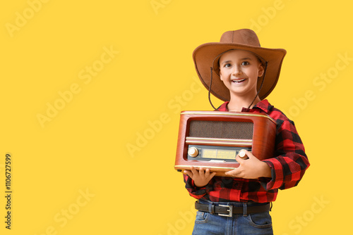 Cute little cowboy with ret...