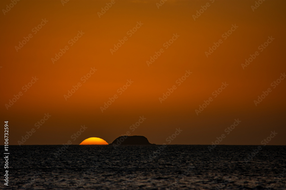 Breathtaking Sunset over the Ocean at Cabo de la Vela, La Guajira, Colombia Breathtaking Sunset over the Ocean at Cabo de la Vela, La Guajira, Colombia