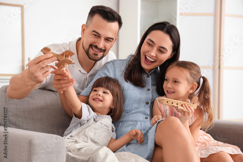 Happy family playing with w...