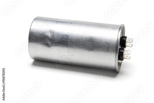air conditioner's compressor capacitor isolated on white background. Usually found on outdoor unit.