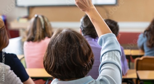 Back view of older student raising his hand to answer teacher's question during education training class. jpg ai image