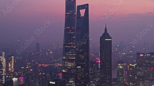 4K real time Aerial View of Shanghai skyline at night with the Winding Huangpu River background.