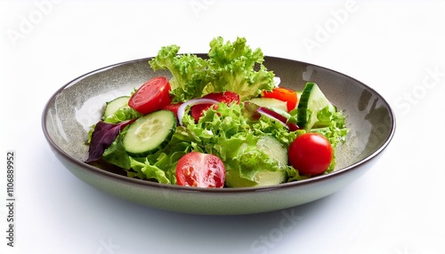 plate of salad with fresh vegetables on isolated white background