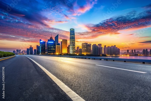 Expansive Empty Asphalt Road Leading to a Modern City Skyline in Hangzhou at Dusk, Capturing the Essence of Urban Exploration and Architectural Beauty