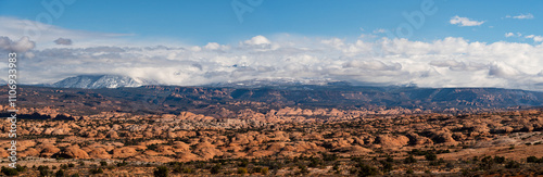 Petrified dunes, Arches national park, Utah, panoramic view, winter with snow on distant mountains.