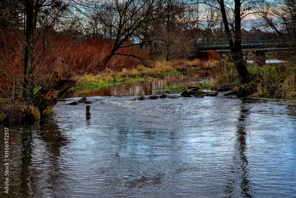 Autumn on the river on a cloudy day. Autumn on the river on a cloudy day.