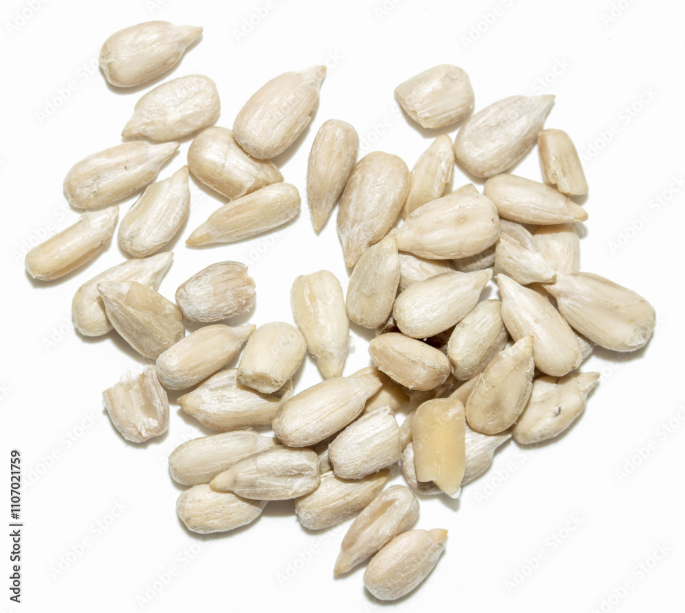 sunflower seeds kernels on a white background sunflower seeds kernels on a white background