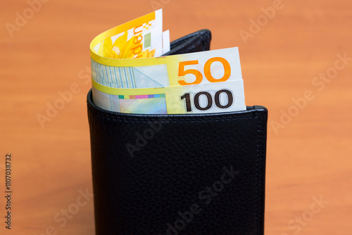 Dutch guilder in the black wallet