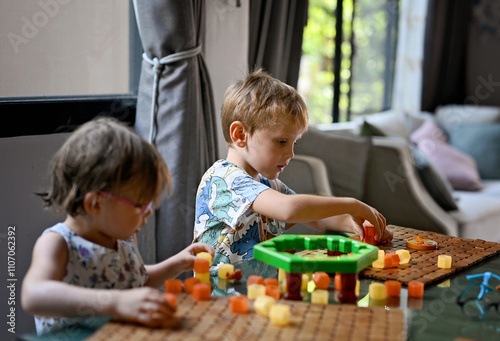Sibling with board game