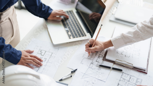 Architecture drawing on architectural project business architecture building construction Colleagues designer Planning Design on blueprint and compasses