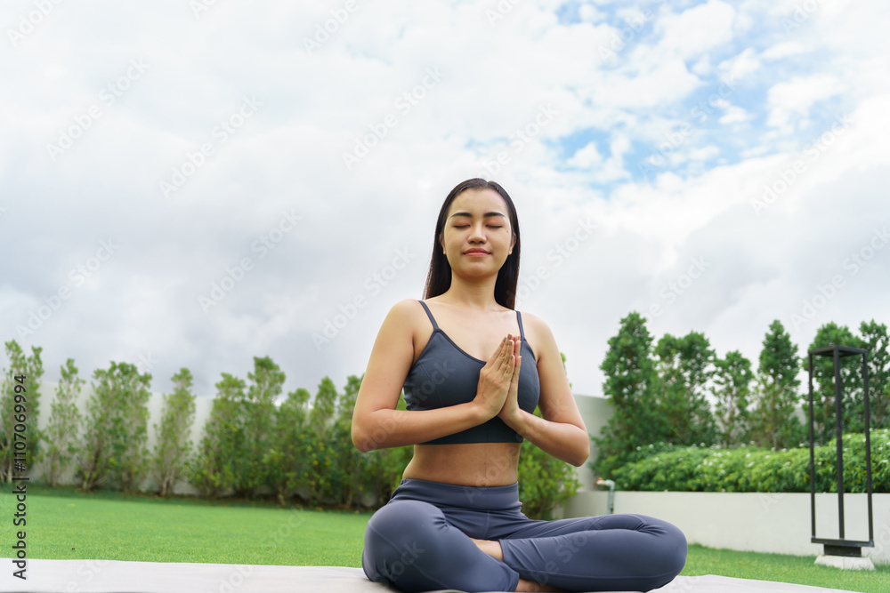 Beautiful confident asian woman practices yoga in green park relax in nature. Portrait Asian girl do serene sincere peaceful in morning park sportswoman wellness health Beautiful confident asian woman practices yoga in green park relax in nature. Portrait Asian girl do serene sincere peaceful in morning park sportswoman wellness health