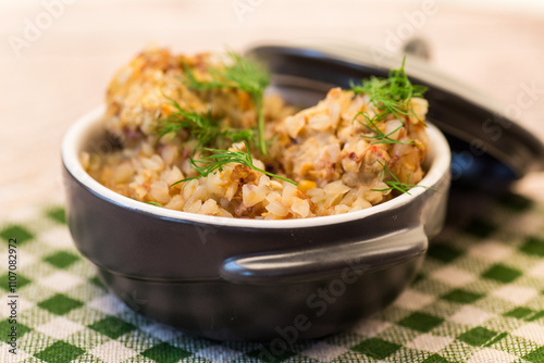 cooked boiled buckwheat with chicken meatballs