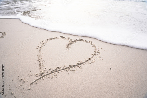 Love written in sand on the beach | Heart shape in sand on the beach | Postcard photo for marriage, partner, husband, wife, fiancé | Love for the oceans and love for the beach