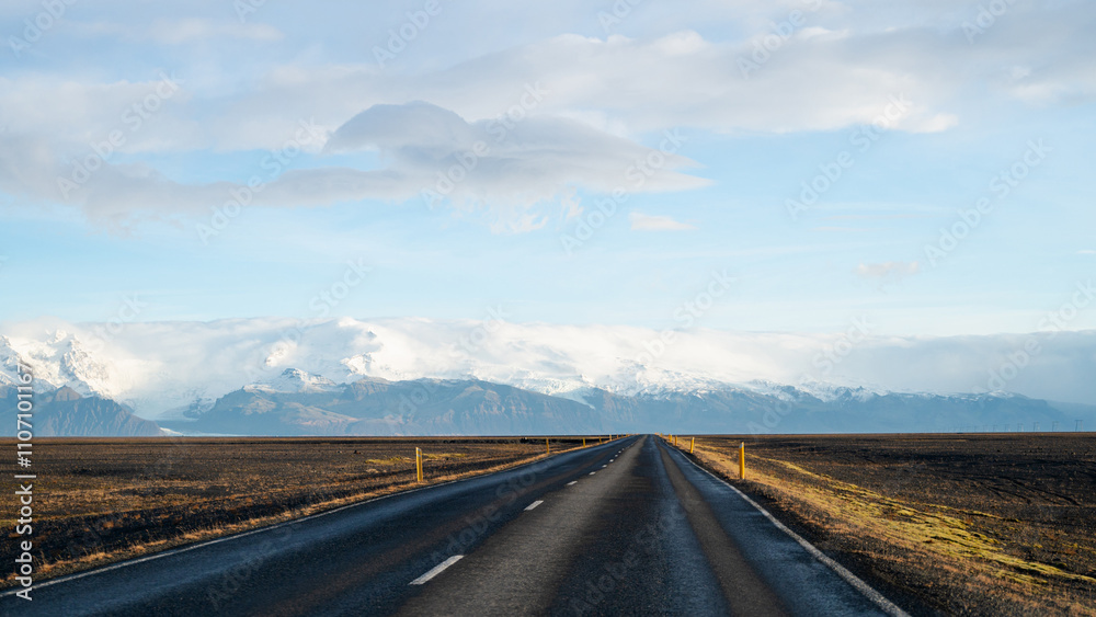 Empty asphalt road in Iceland. Touristic travel route. Beautiful landscape. Cloudy sky. Glacier. Empty asphalt road in Iceland. Touristic travel route. Beautiful landscape. Cloudy sky. Glacier.