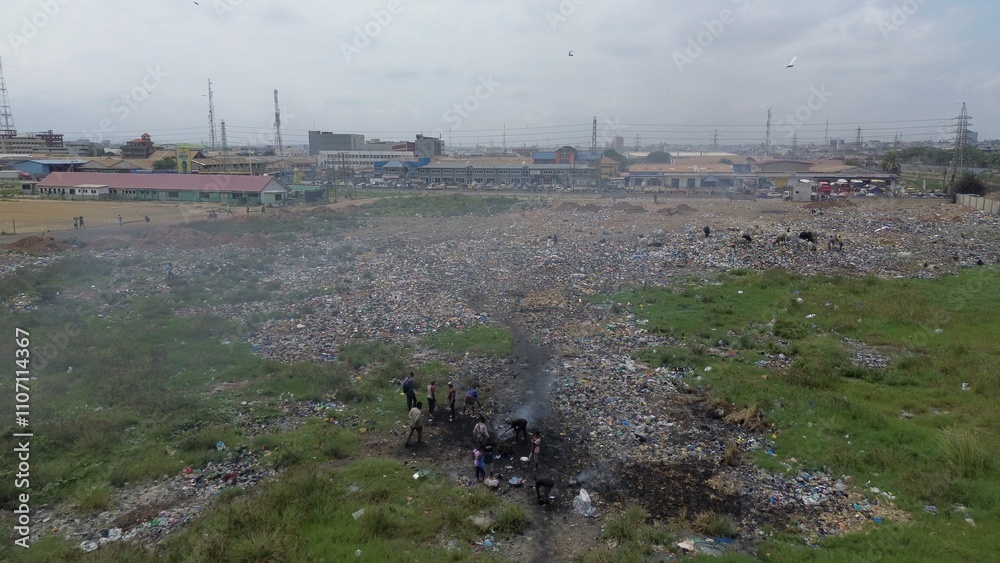 Ghana, Accra, 10,18,24 AGBOGBLOSHIE people live in slum largest landfill illegal dump in Africa for electronic and plastic waste. Odaw River High environmental toxic pollution area, climate change