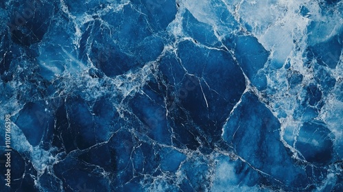 A stunning close-up of deep blue marble, showcasing intricate patterns and vibrant hues.