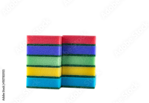 Colorful sponges for washing dishes on a white background photo