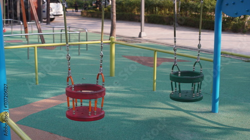 Toddler swing at public park playground