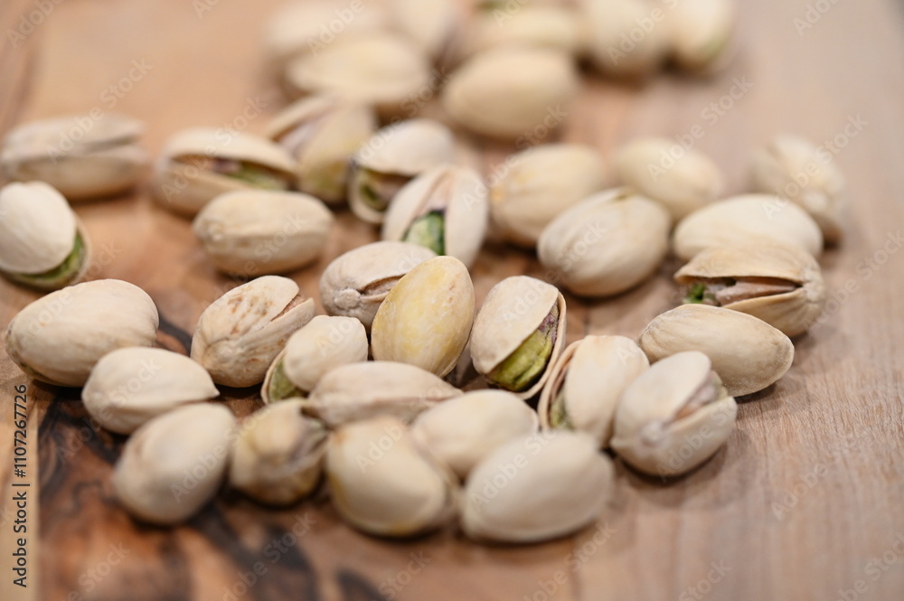 close up of a bunch of pistachios close up of a bunch of pistachios