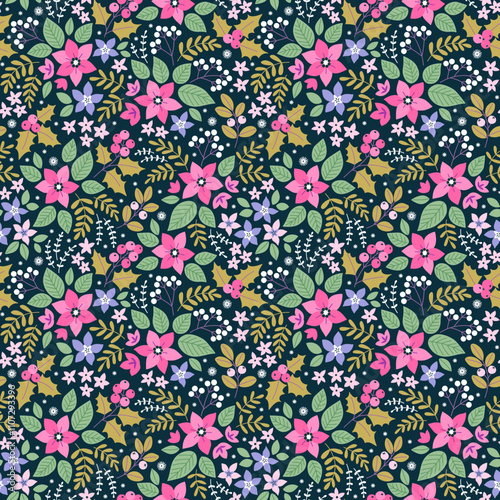 Beautiful floral pattern in small abstract flowers. Small colorful flowers. Dark blue background. Liberty print. Floral seamless background. Vintage template for fashion prints. Stock pattern.