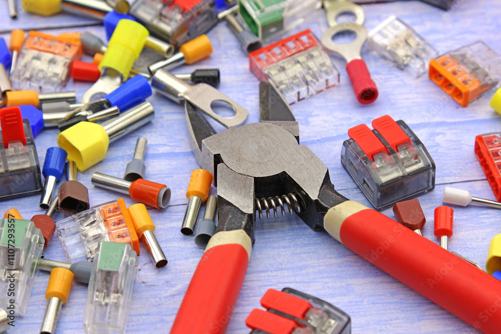 Electrical installation tools and materials for the assembly of electrical equipment. Soft focus. Close-up. Electrical installation tools and materials for the assembly of electrical equipment. Soft focus. Close-up.