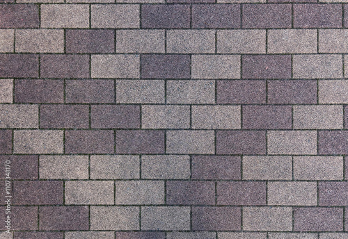 The texture and pattern of gray sidewalk tiles