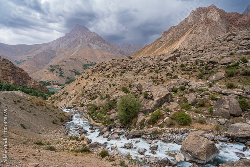 Scenic overcast summer mountain landscape view in Marguzor seven lakes area aka Haft Kul, Shing river valley, Fann mountains, Sughd, Tajikistan photo