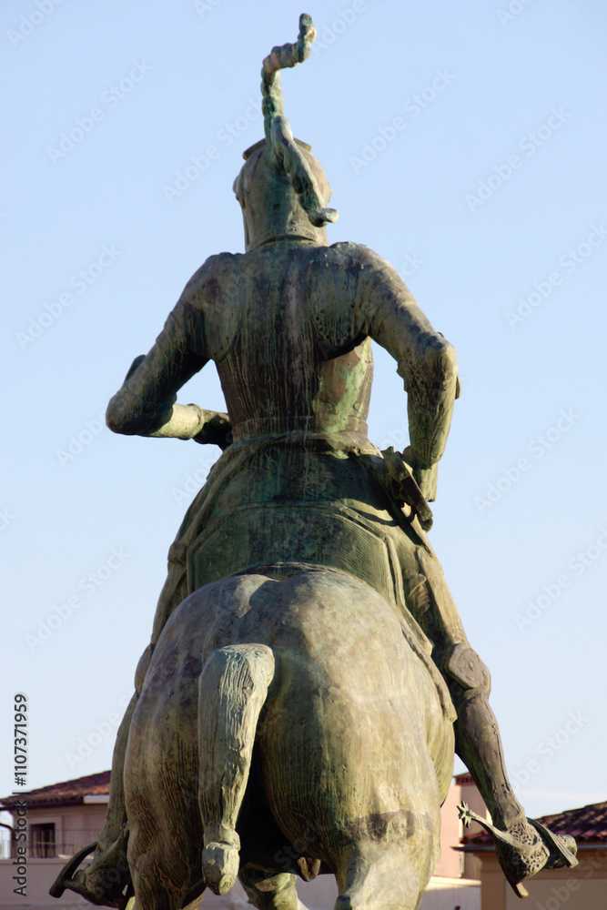 Fototapeta premium Trujillo (Cáceres) Spain. Rear of the equestrian monument of Francisco de Pizarro in the main square of the town of Trujillo