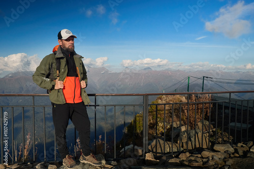 a man travels in the mountains , a portrait of a man