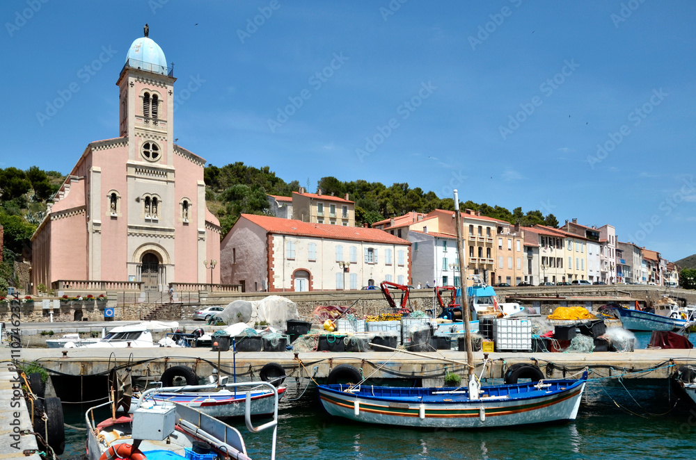Fototapeta premium Fisching port and church Notre-Dame de Bonne Nouvelle viewed of front at Port-Vendres, commune on the 