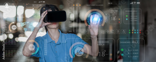 Engineer checking construction process railway and wearing virtual reality glasses(VR) checking work on ailroad station . Railway engineer checking machines with virtual reality glasses(VR) photo