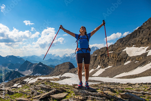 Sporty woman hiking in Switzerland alps. Heathy lifestyle, sport, beauty in nature. Grindelwald valley, Swizz photo