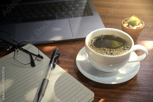 cup of coffee and laptop